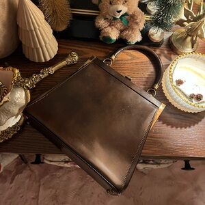 Brown vintage authentic leather bag with gold hardware in perfect condition!